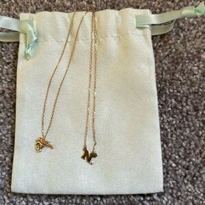 14k gold letter n necklace.